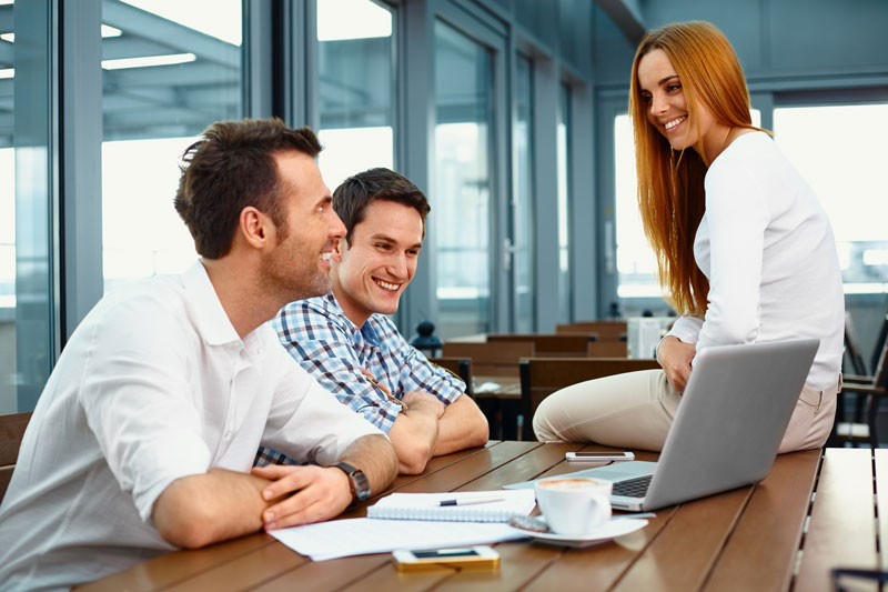 man and woman on laptop